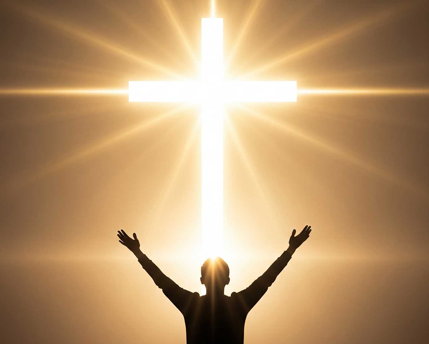 Um homem ergue os seus braços em frete a um cruz brilhante em sinal de adoração ao Deus altíssimo.